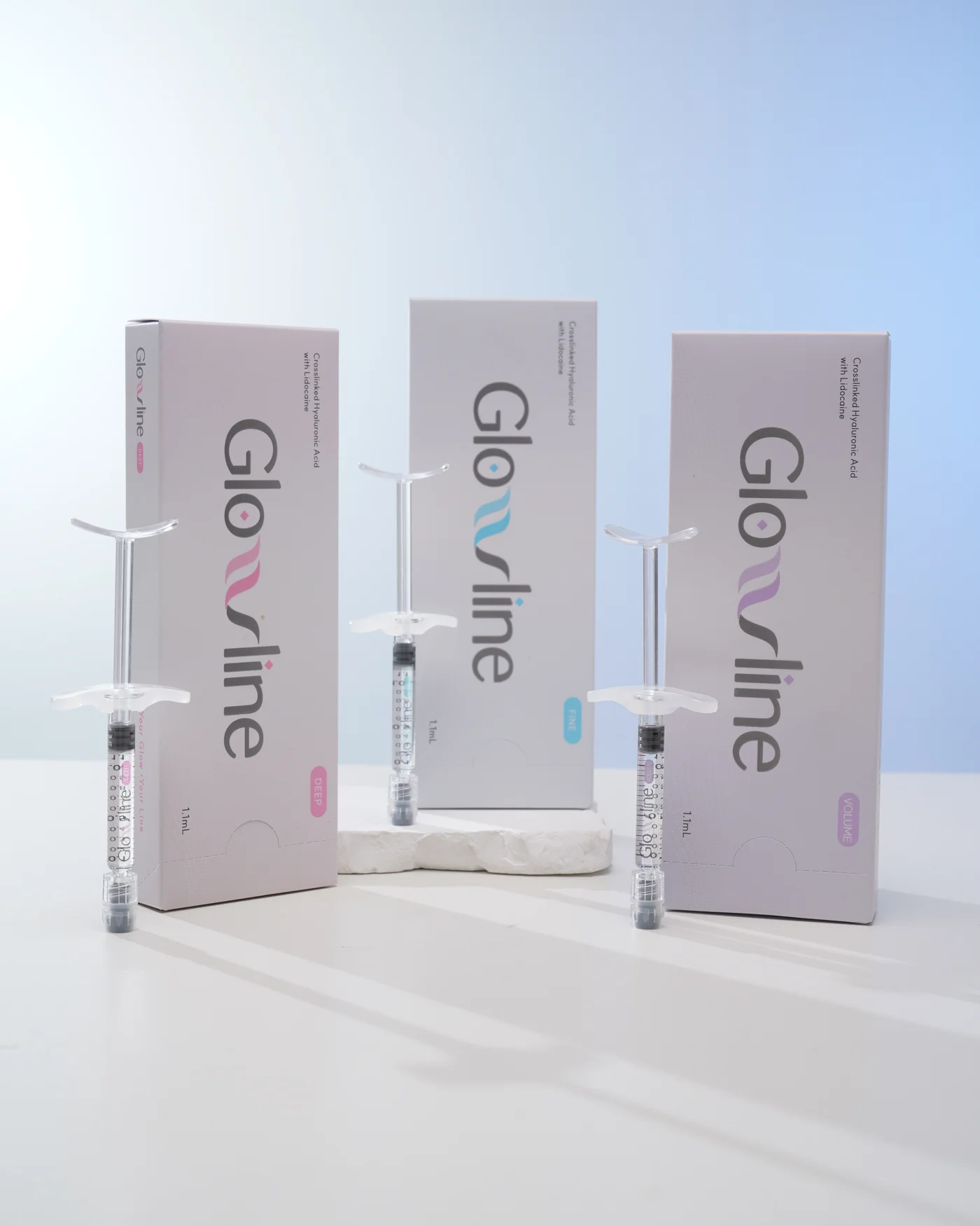 The Glowline range: Deep, Fine and Volume cartons with their pre-filled syringes